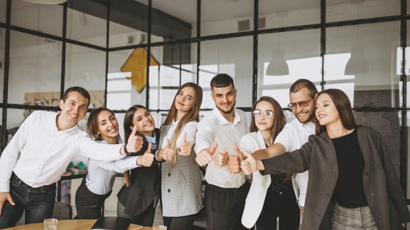 Group of people working out business plan in an office